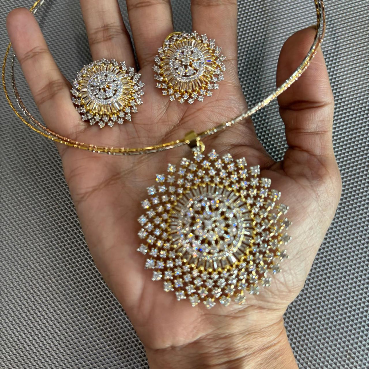Close up of Emarti American CZ Diamond statement pendant necklace set with matching stud earrings and chain