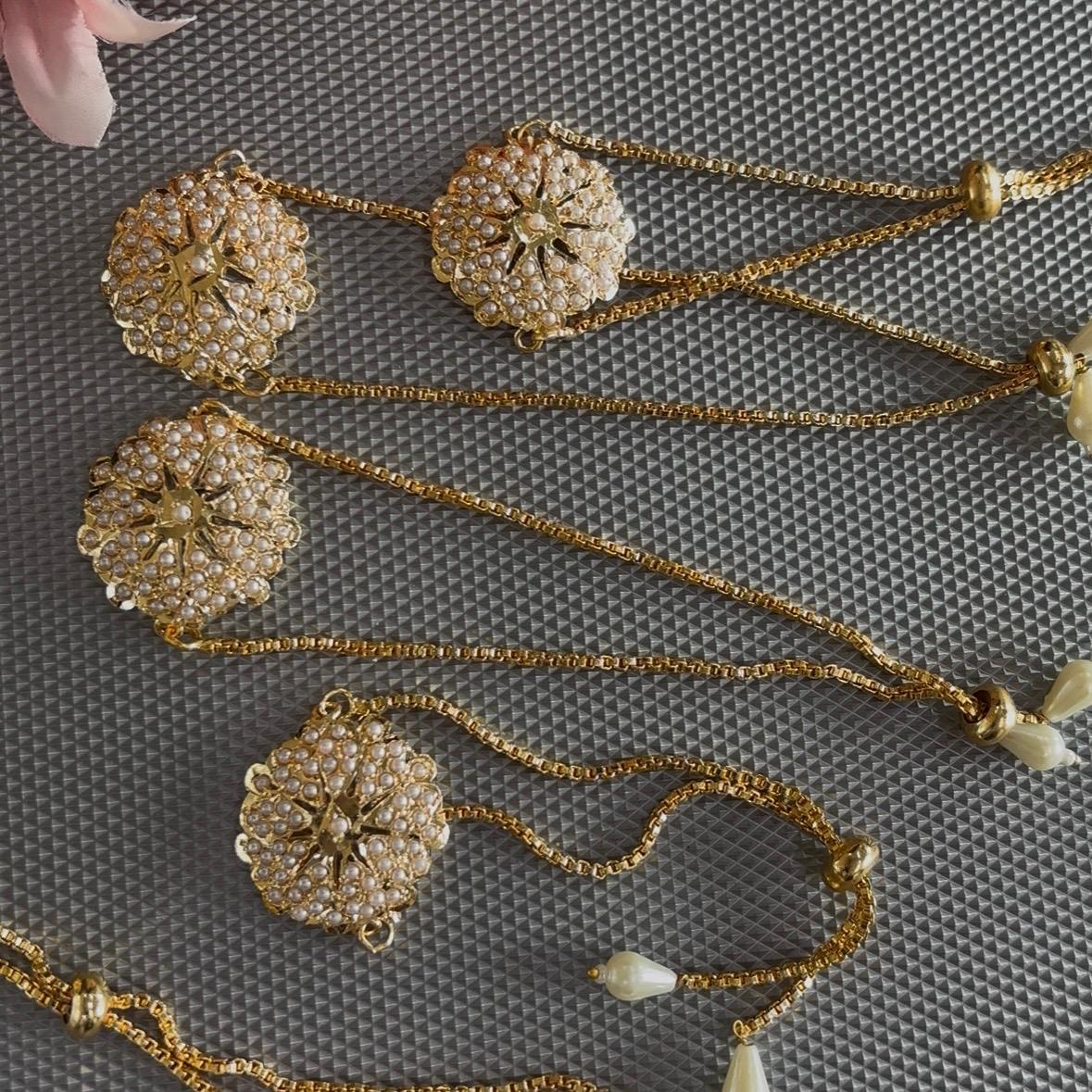 Collection of Pearl jadau bracelet rakhi in gold tone