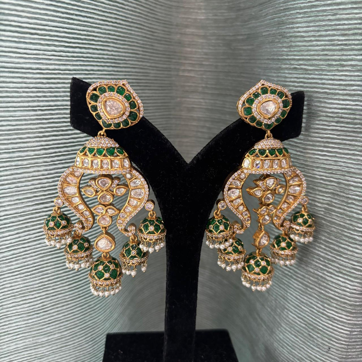 Emerald kundan multi jhumka earrings with epoxy work detailling