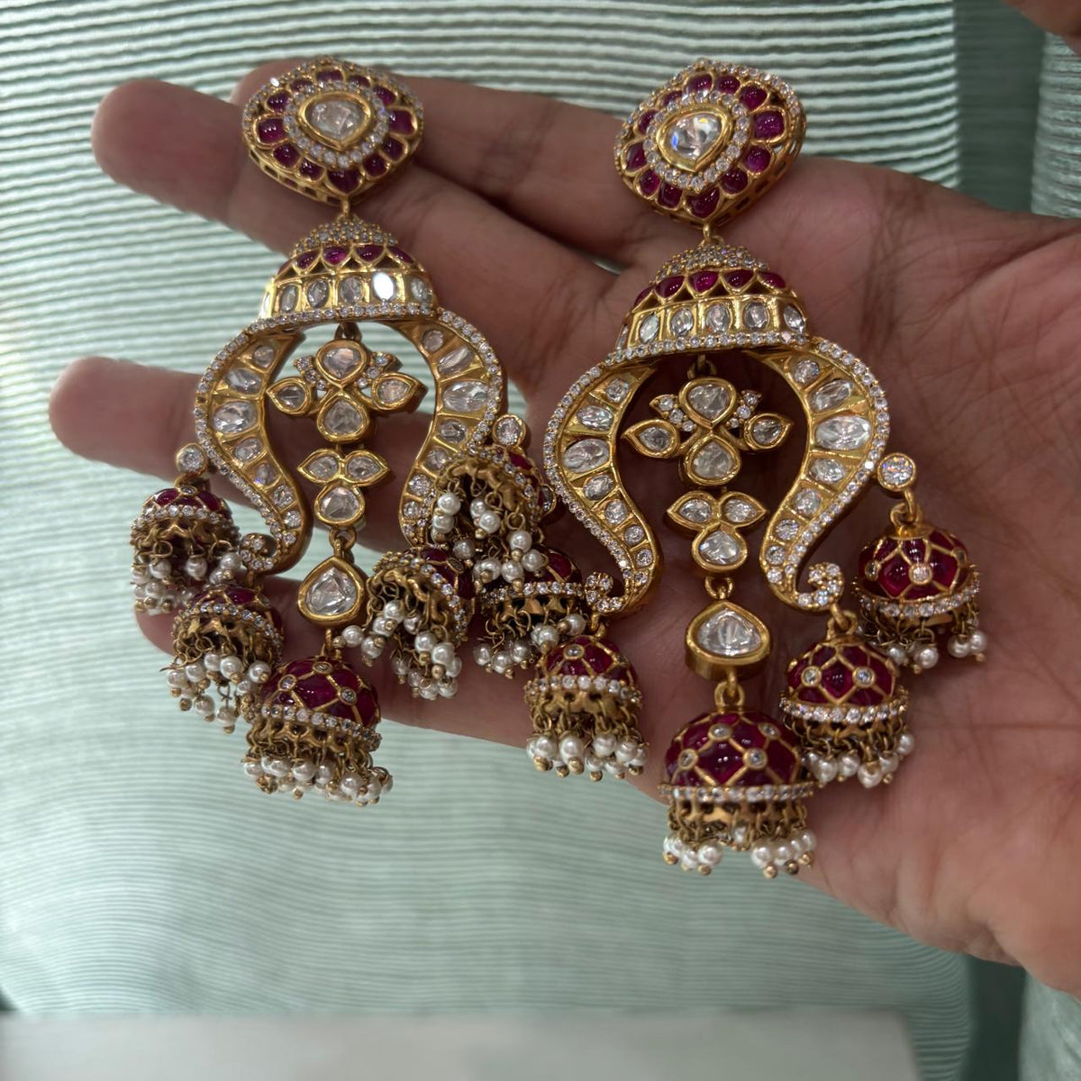 Hand held Rani ruby kundan multi jhumka chandbali earrings in gold plated with epoxy work