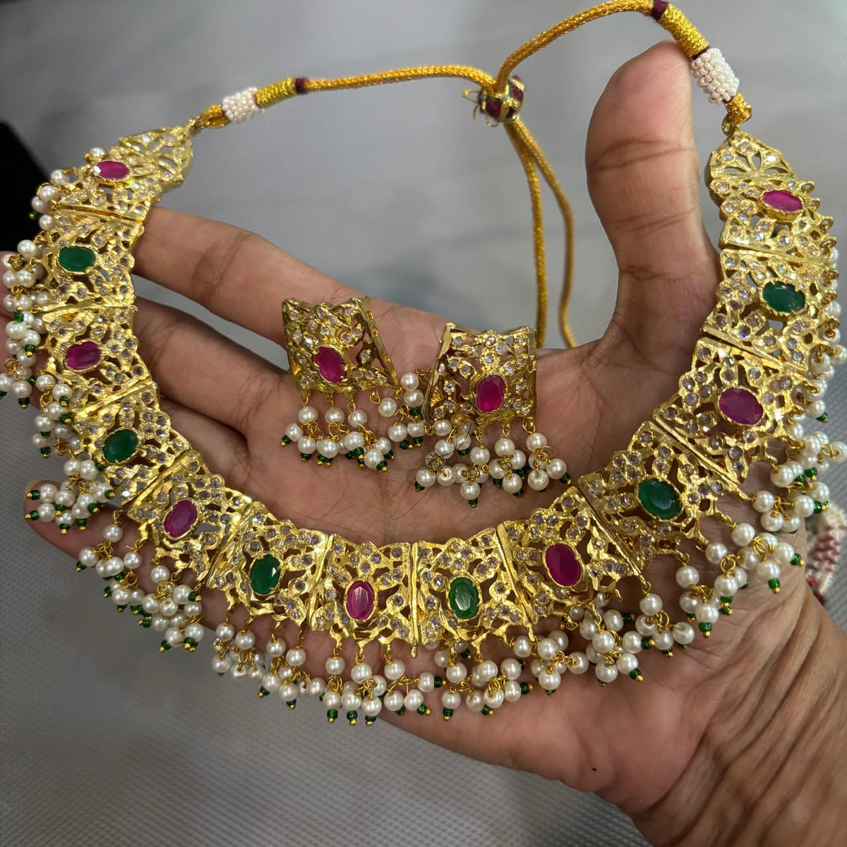 Gold plated jadau multi stones necklace set with emerald & ruby and stud earrings