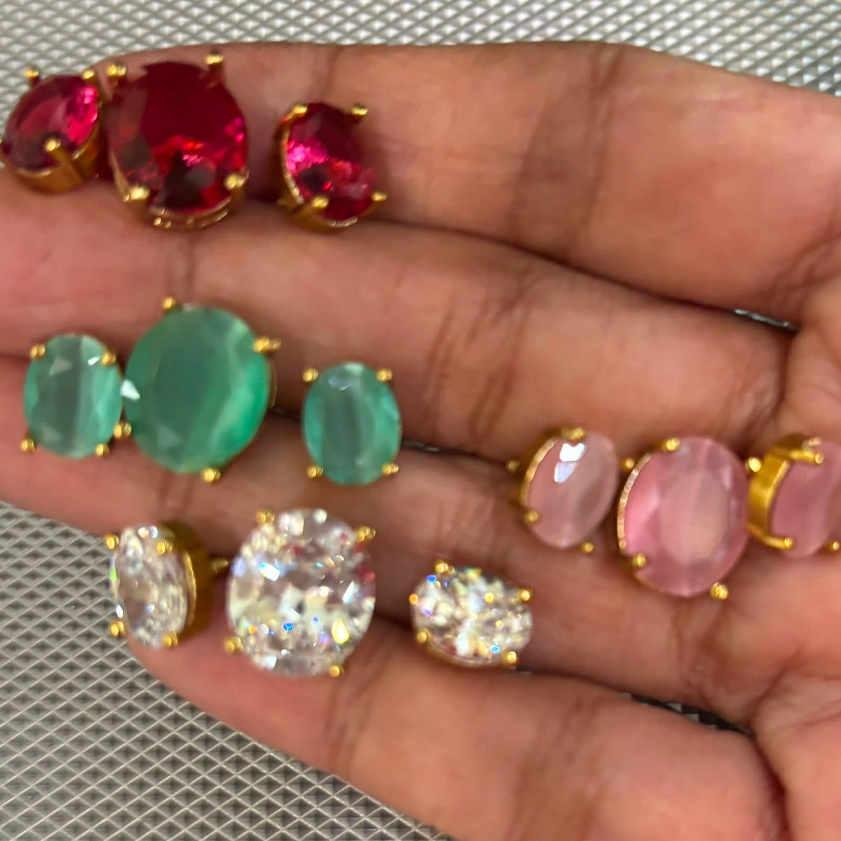 American diamond necklace set in mint green , light pink , clear crystal , emerald green and ruby coloured jewellery stones in gold tone settings