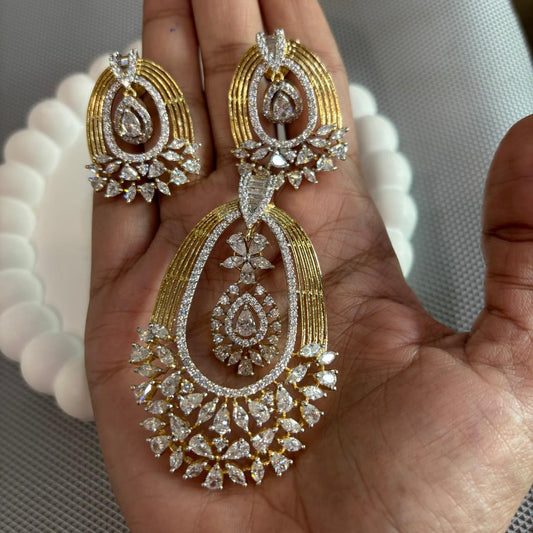 Hand held American Diamond pendant and earrings set with pear and marquise style stone