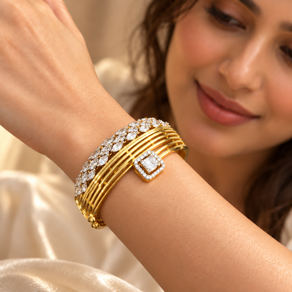 Model wearing the Anshi gold-plated American diamond bracelet with marquise CZ stones and a square halo detail