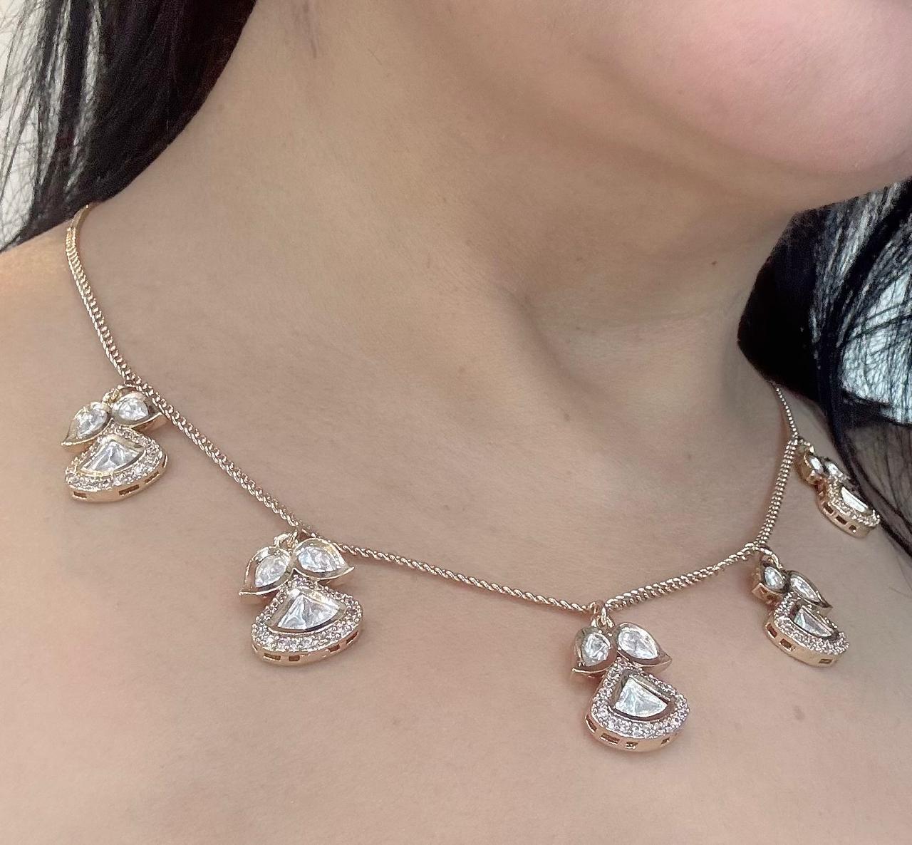 dianty kundan and american diamond set in gold