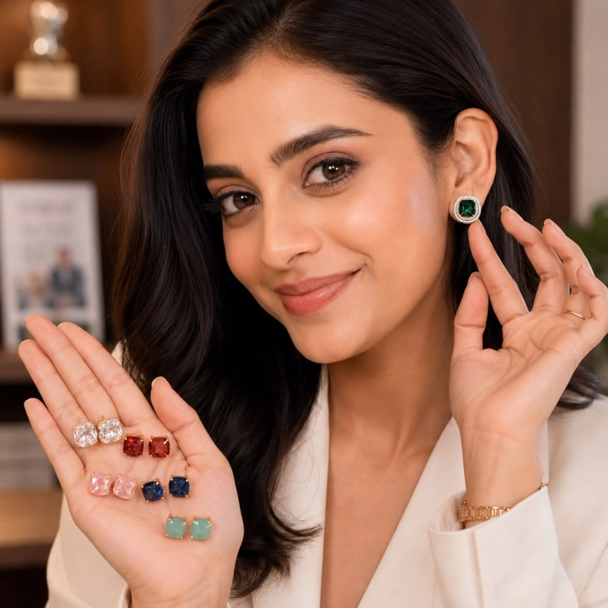 women wearing green interchangeable crystal studs and holding multiple colour studs by Bebaak Jewels