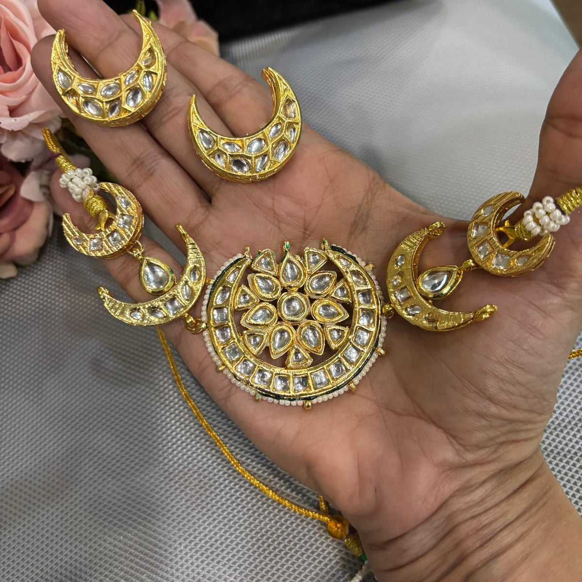  Crescent moon choker  necklace  set with white Kundan stones and pearl border in gold plating 