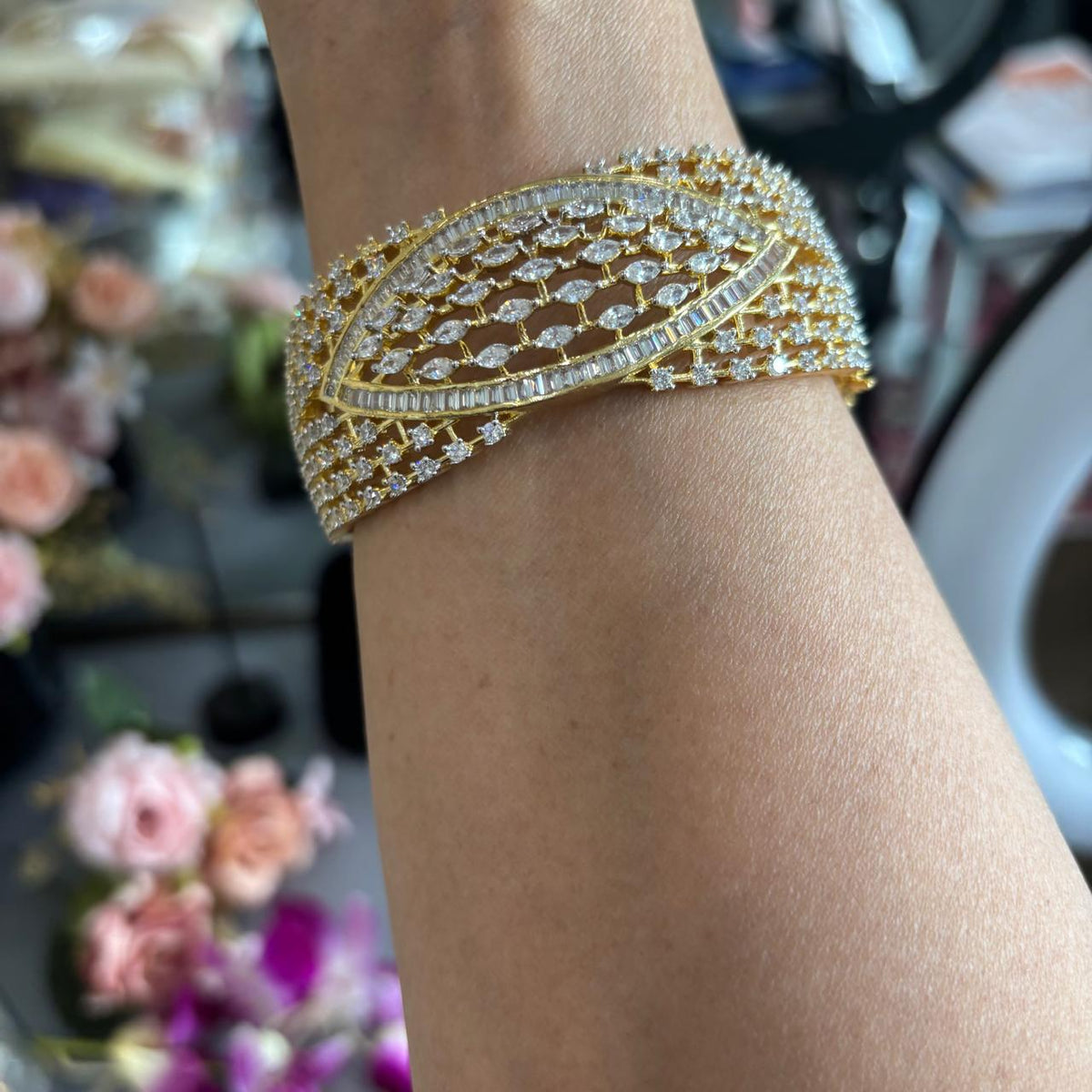 American Diamond cuff bracelet with baguette and marquise stones on hand