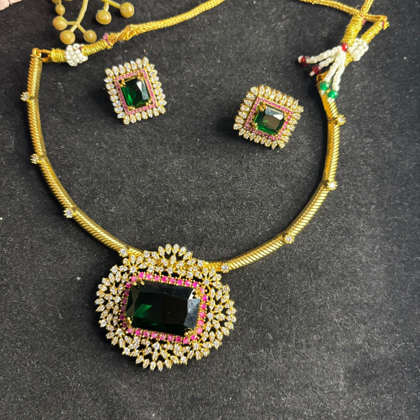 Emerald green American Diamond pendant necklace set with matching stud earrings