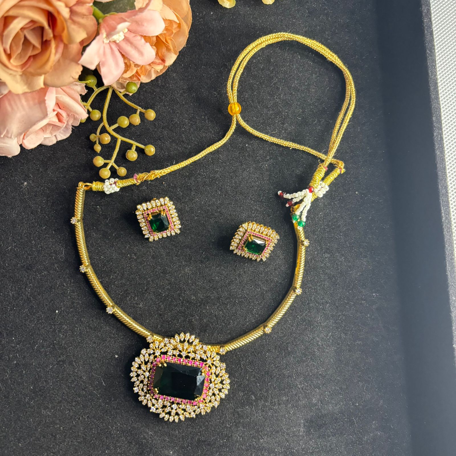 Emerald green American Diamond pendant necklace set with matching stud earrings