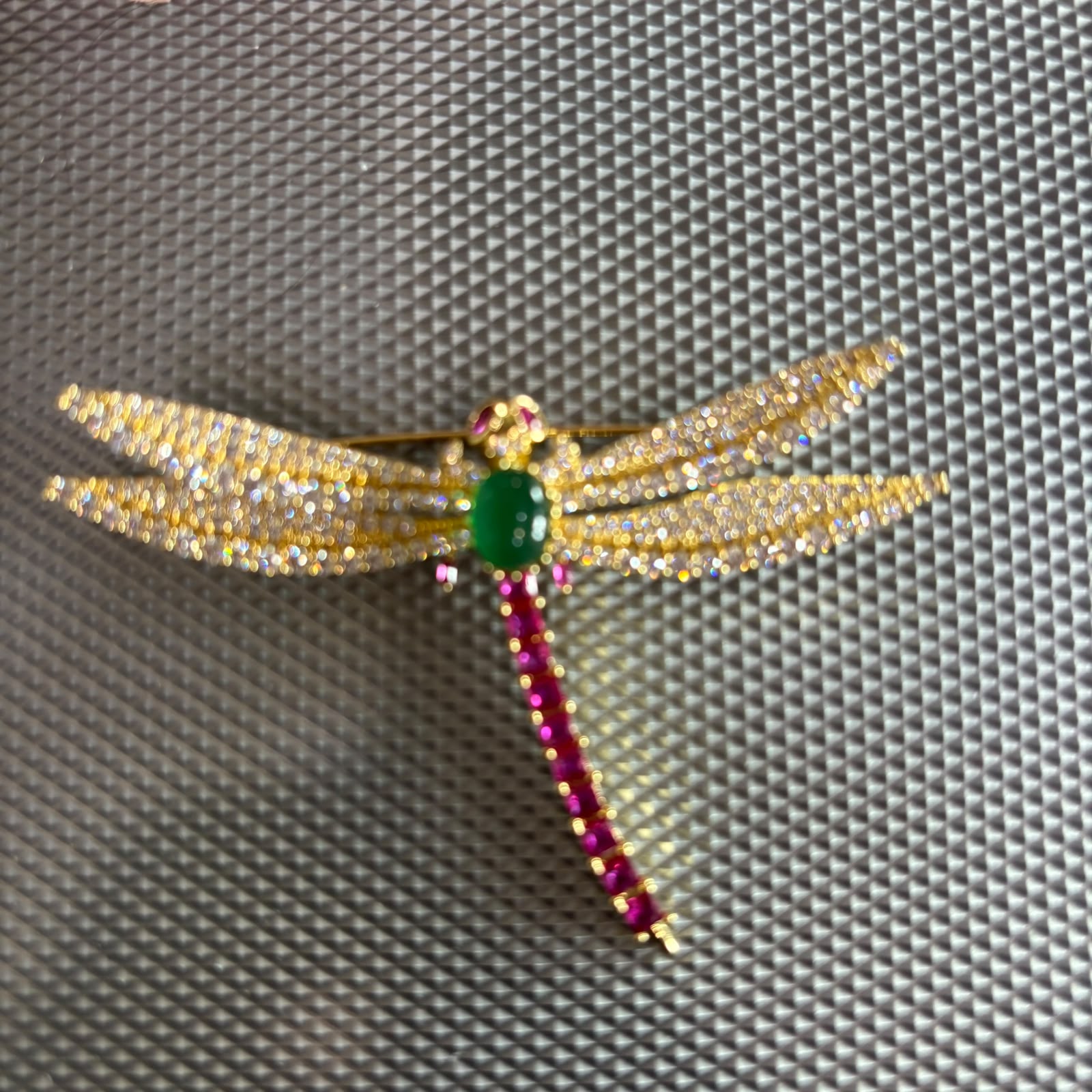 Luxury dragonfly brooch pin with green stone, ruby tail and cubic zirconia wings in gold finish for saree blazer sherwani styling