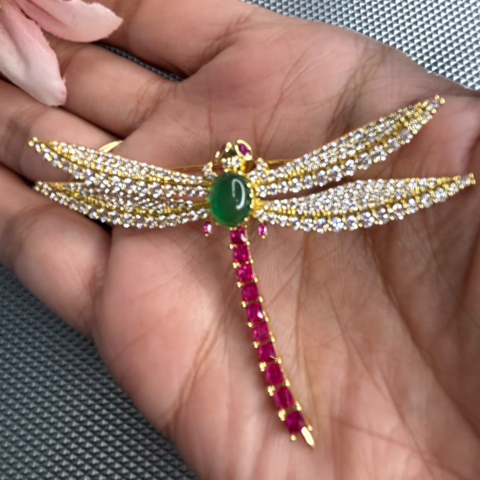 Luxury dragonfly brooch pin with green stone, ruby tail and cubic zirconia wings in gold finish for saree blazer sherwani styling