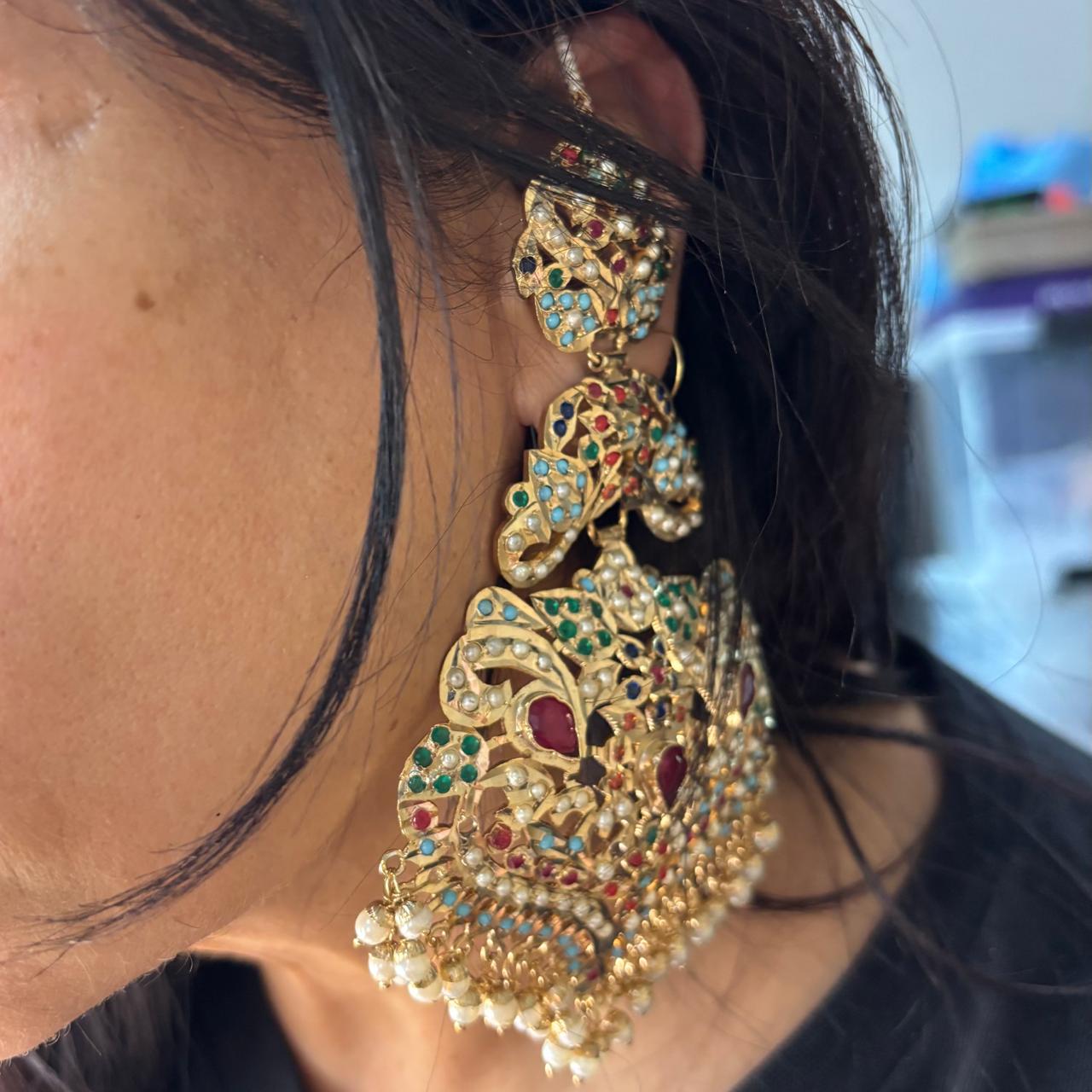 Handcrafted gold plated Jadau ear climber Kannauti earrings with pearl drops and multicolour stones by Bebaak Jewels.