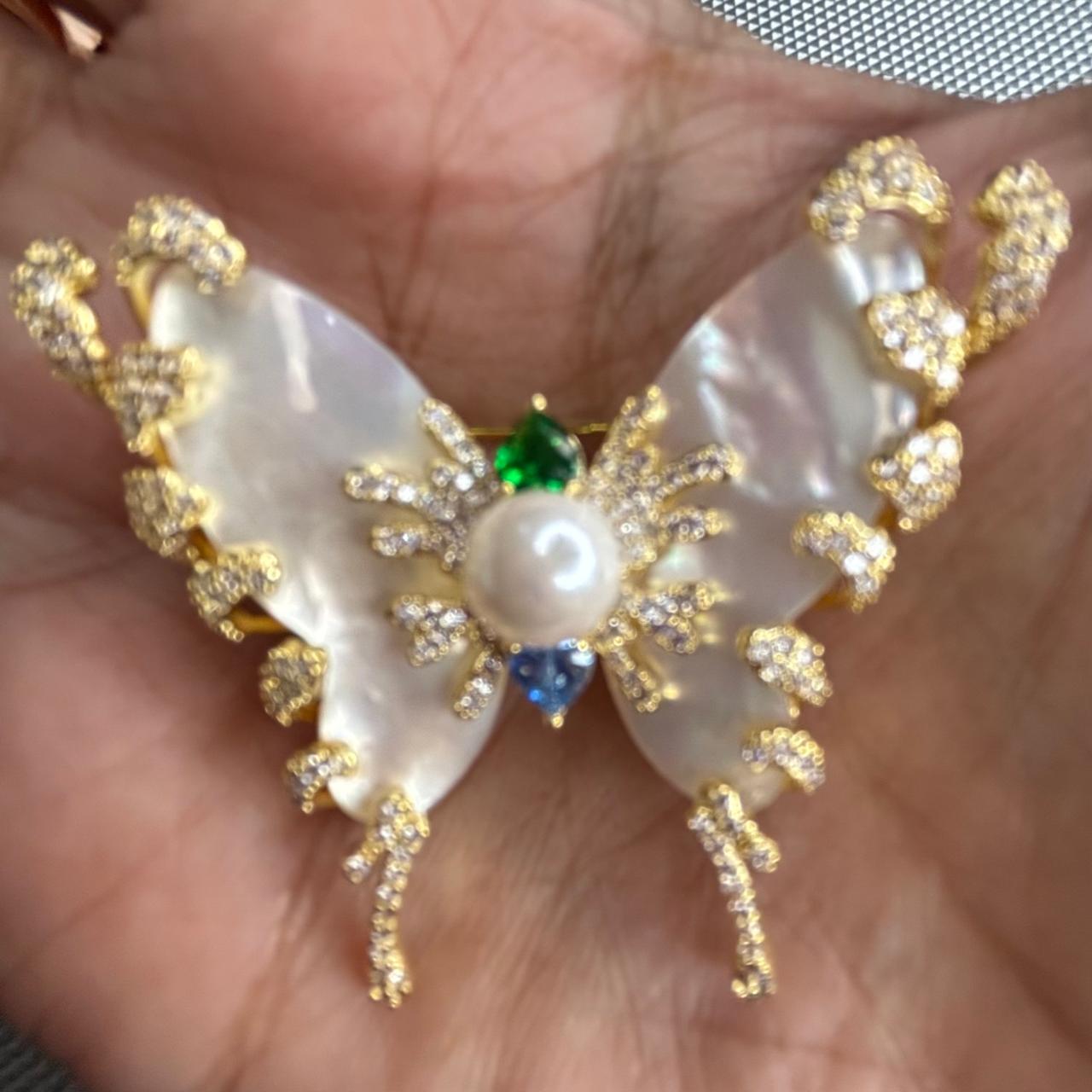 Luxury Mother of Pearl Butterfly Brooch with CZ diamonds detailing, pearl center and gold finish for sarees, blazers, dresses and scarves.