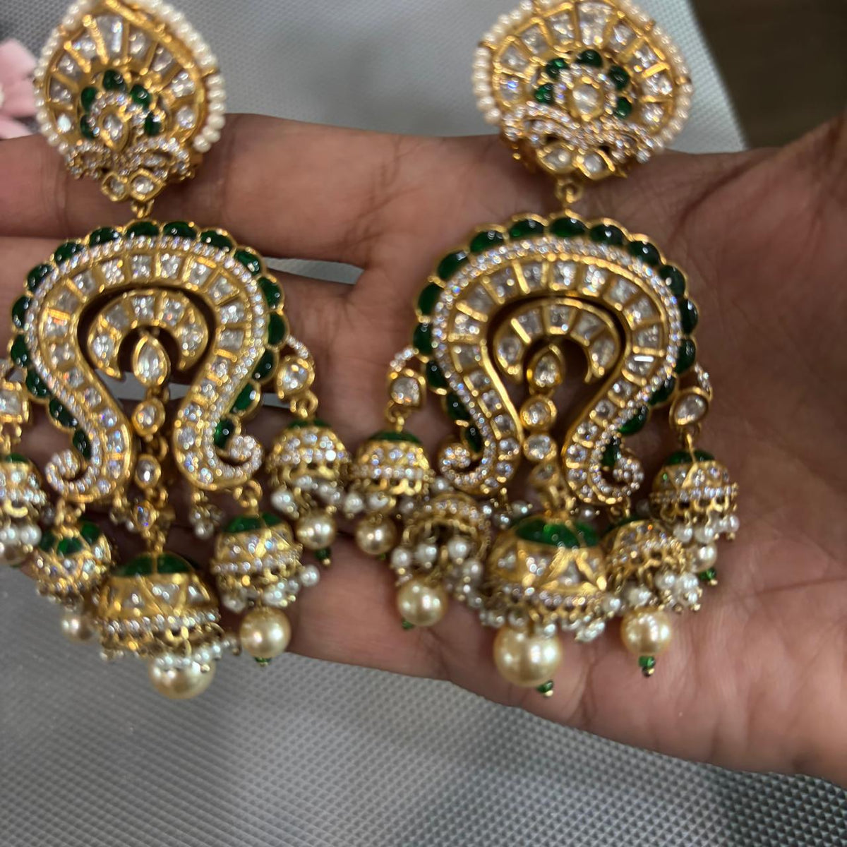 Hand held Statement wedding earrings with green enamel and kundan  and dangling pearl jhumkas earrings