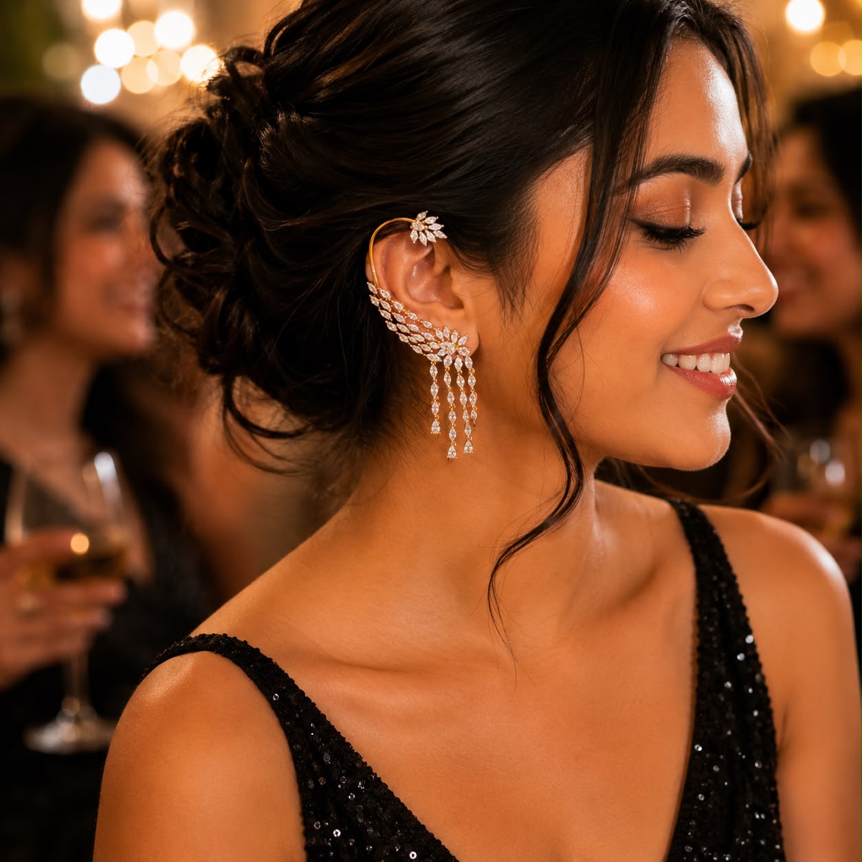 Woman wearing Celeste marquise American Diamond statement ear cuff with cascading stone dangles