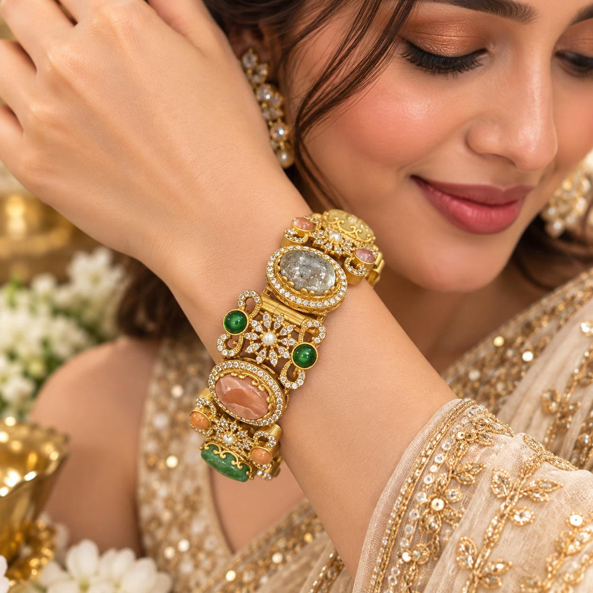 Woman wearing Sabya multistone openable kada bracelet with colourful stones and crystal detailing
