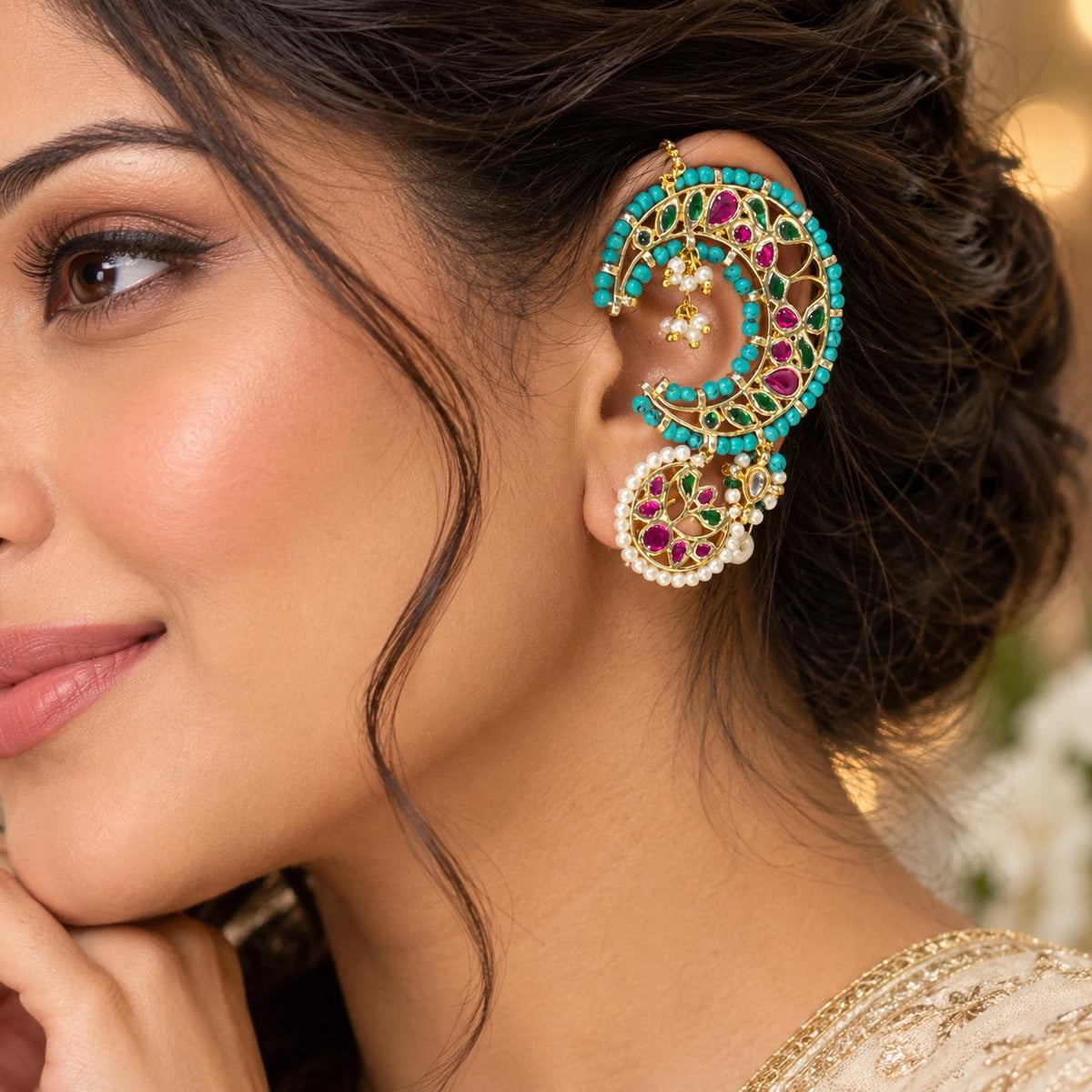 Women wearing Traditional turquoise Kundan kaanphool statement earring styled for wedding wear
