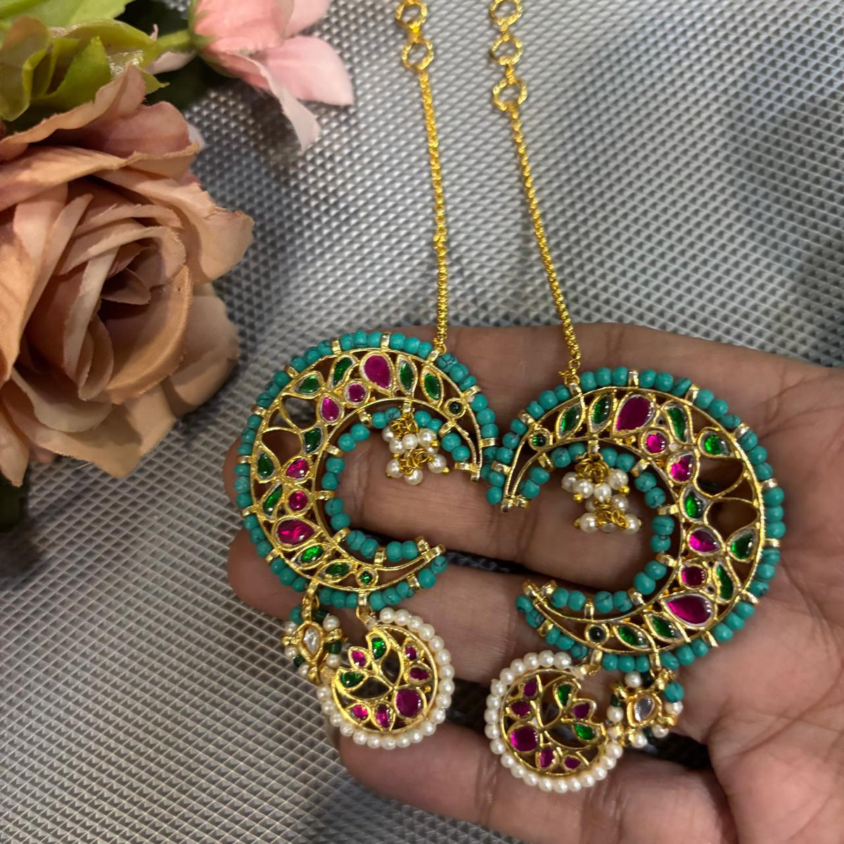 Traditional turquoise Kundan kaanphool statement earring with pearls styled for wedding wear