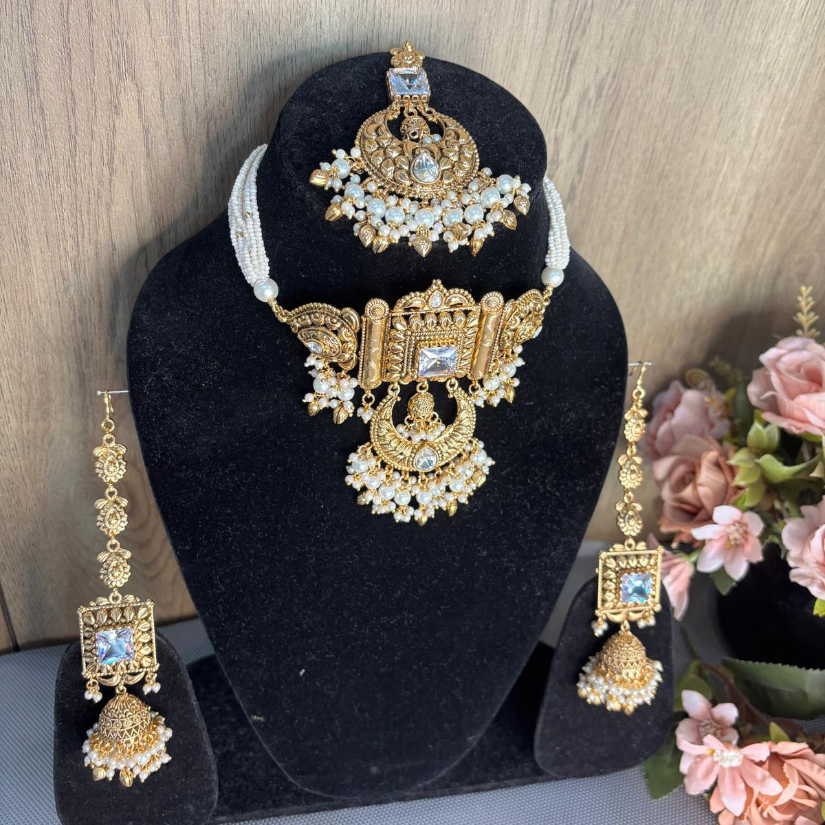 Antique gold bridal choker necklace set with white pearl strands kannauti jhumka earrings and maang tikka by Bebaak Jewels