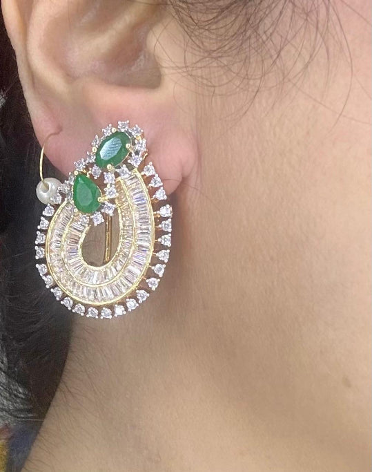  rich baguette cut stones and diamond and emerald pendant set in gold plating