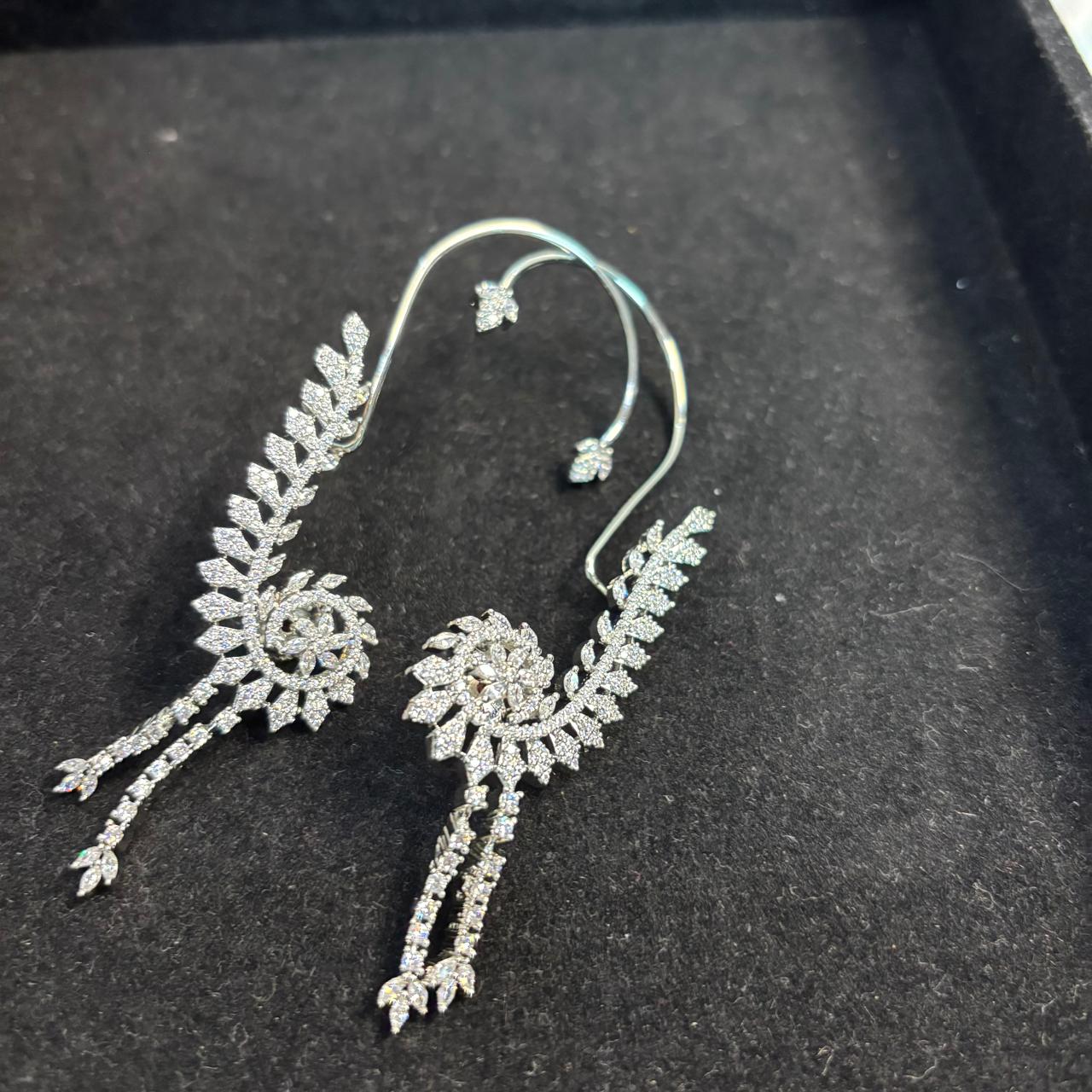 Silver  plated ear cuff earrings with americn diamonds.