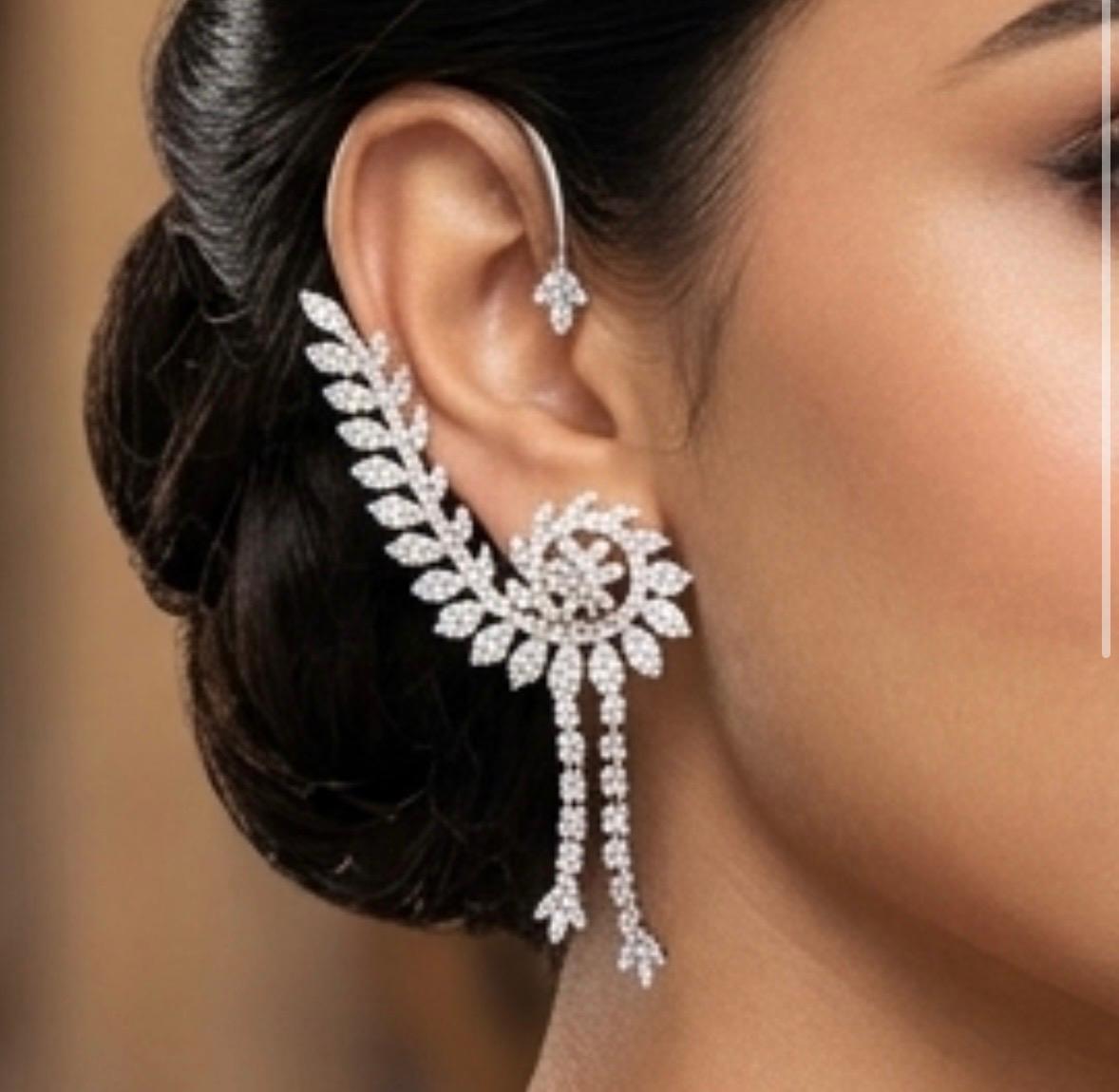 Silver  plated ear cuff earrings with americn diamonds.