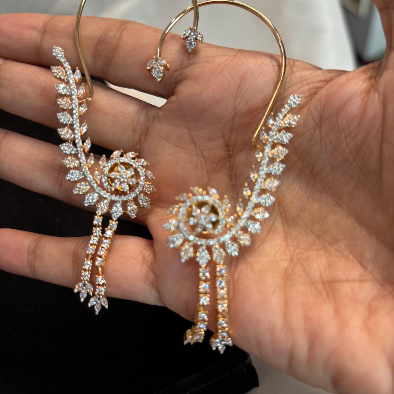 gold plated ear cuff earrings with americn diamonds.