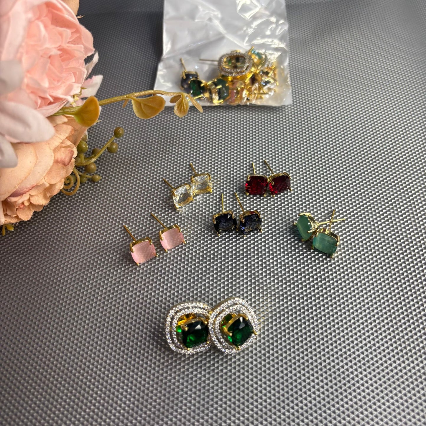 colour changing studs earrings with american diamonds