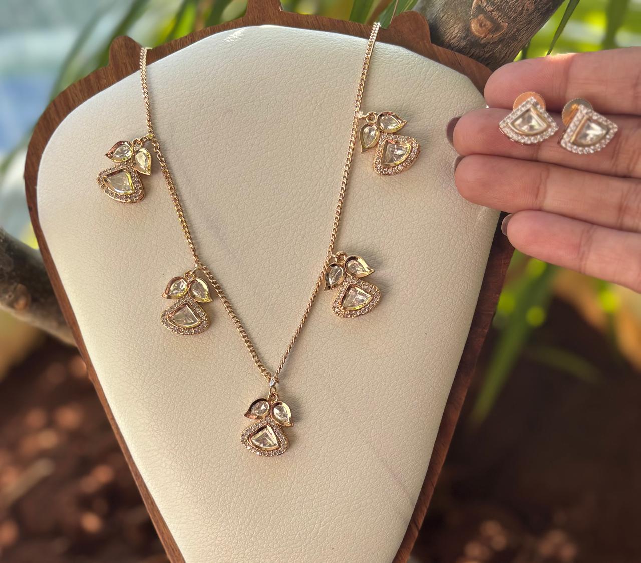 dianty kundan and american diamond set in gold
