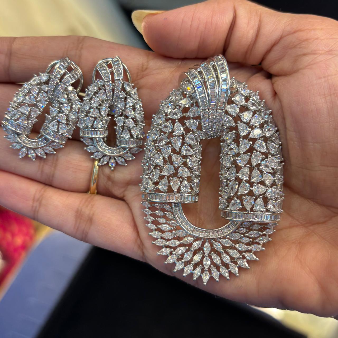 luxury cz diamonds oval silver pendant set with baguette cut diamond and marquise cut diamond and pear cut diamond 