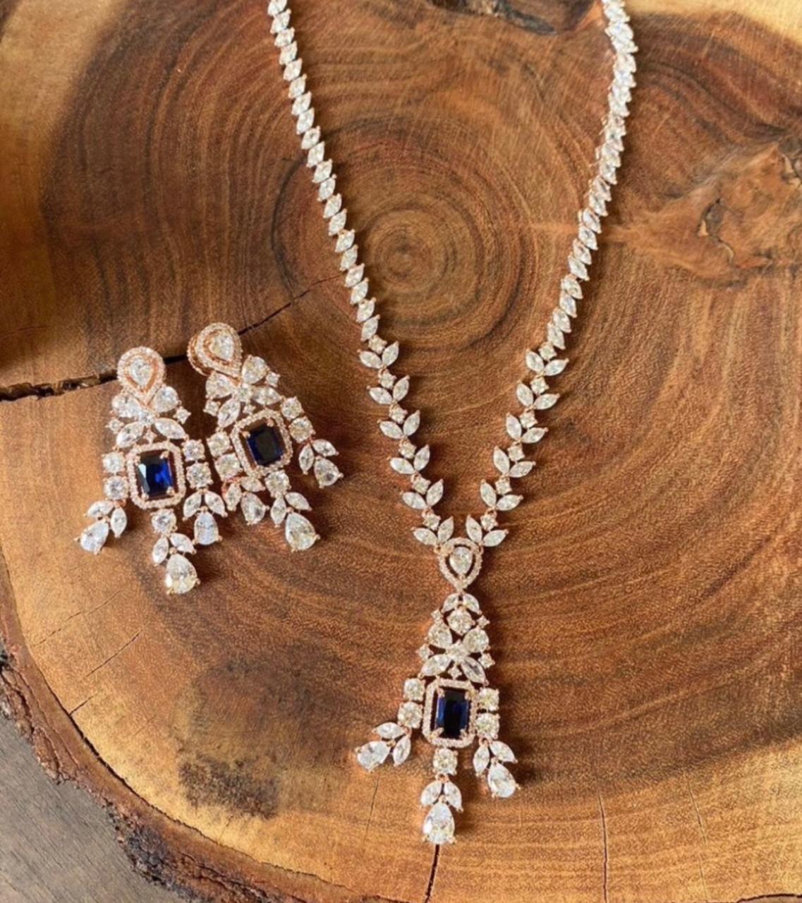 Rosegold Diamond necklace set with blue stone