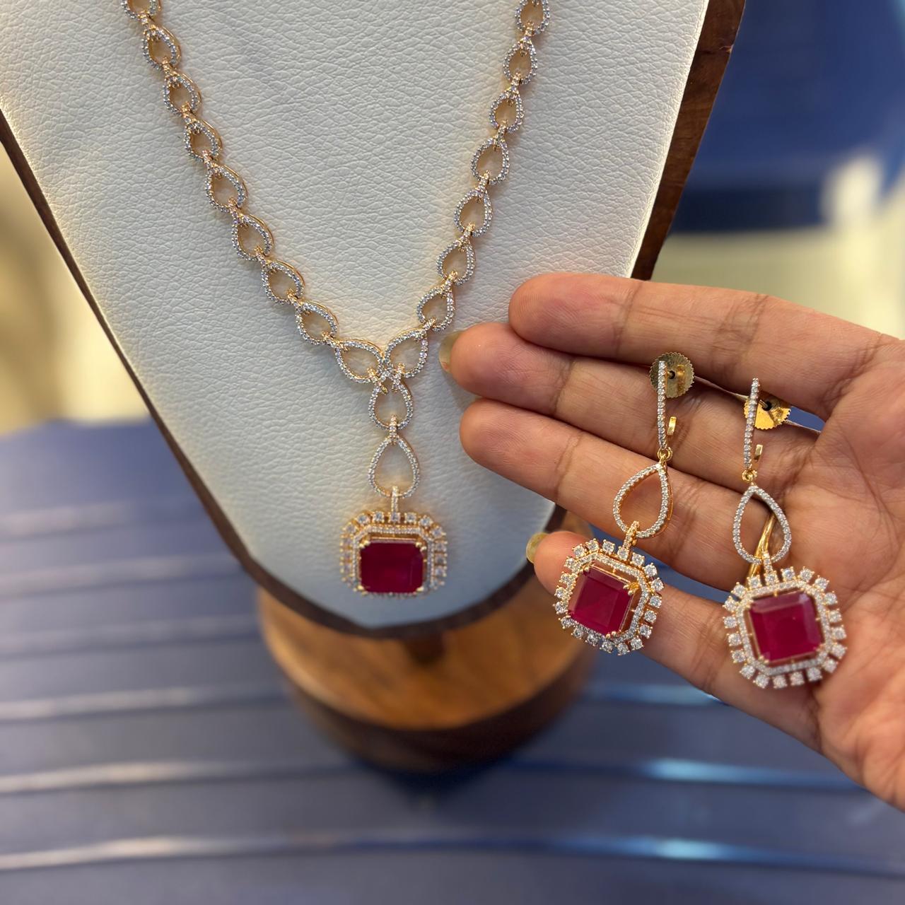 replica of fine jewellery luxurious ruby and american  diamond necklace set