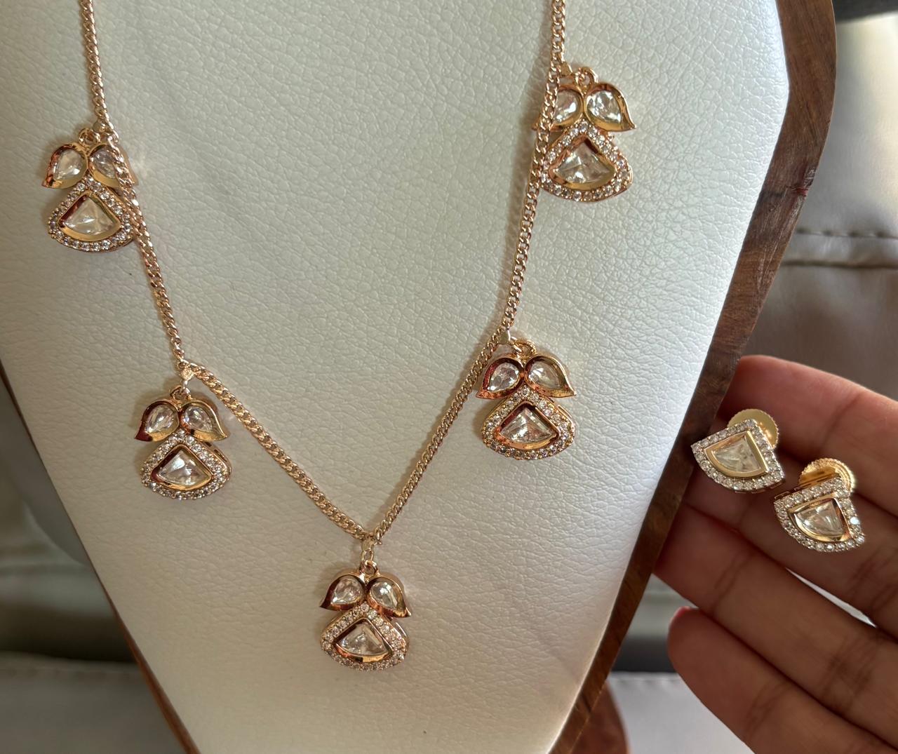 dianty kundan and american diamond set in gold