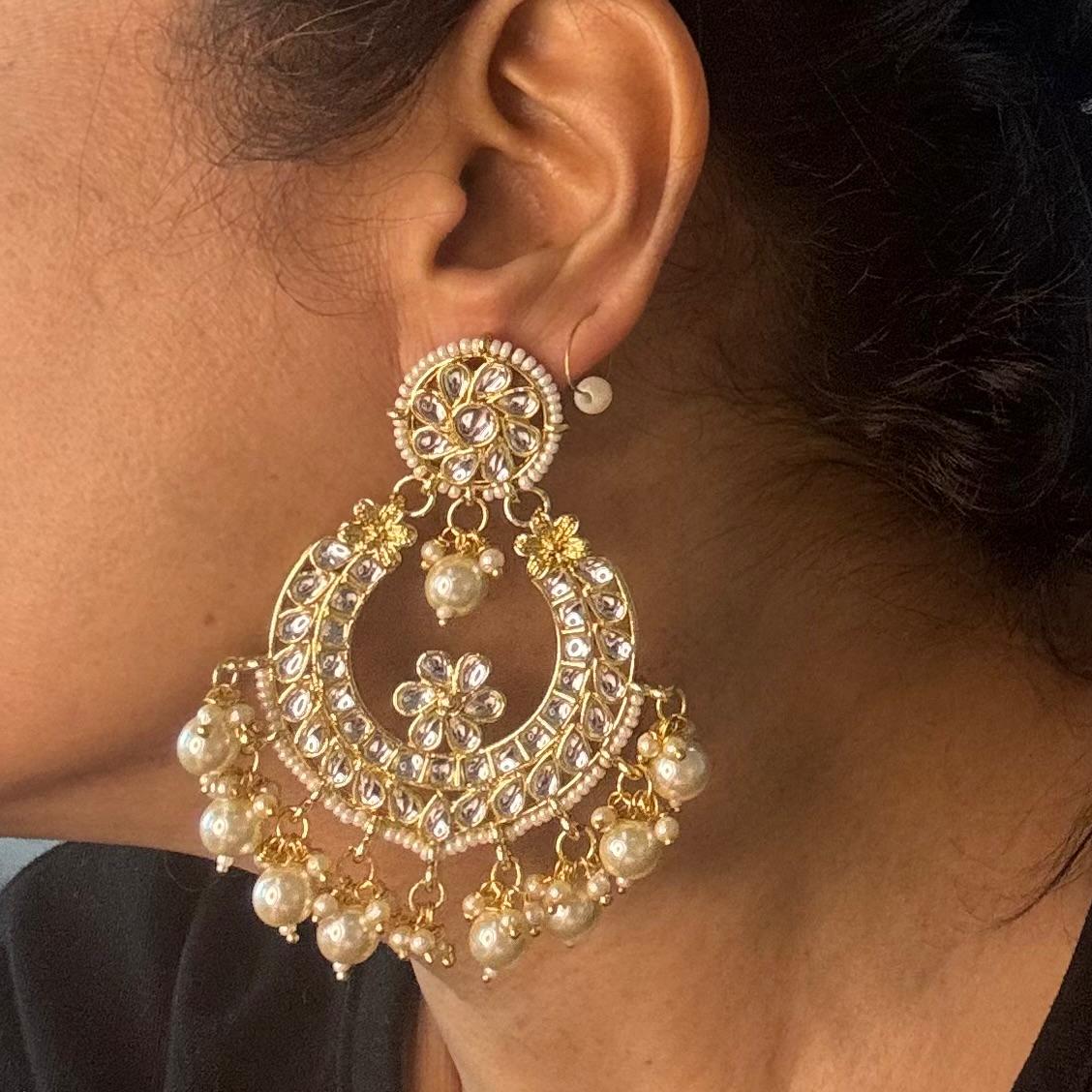 Oversized Indian chandbali earrings with Kundan-style stones and pearls