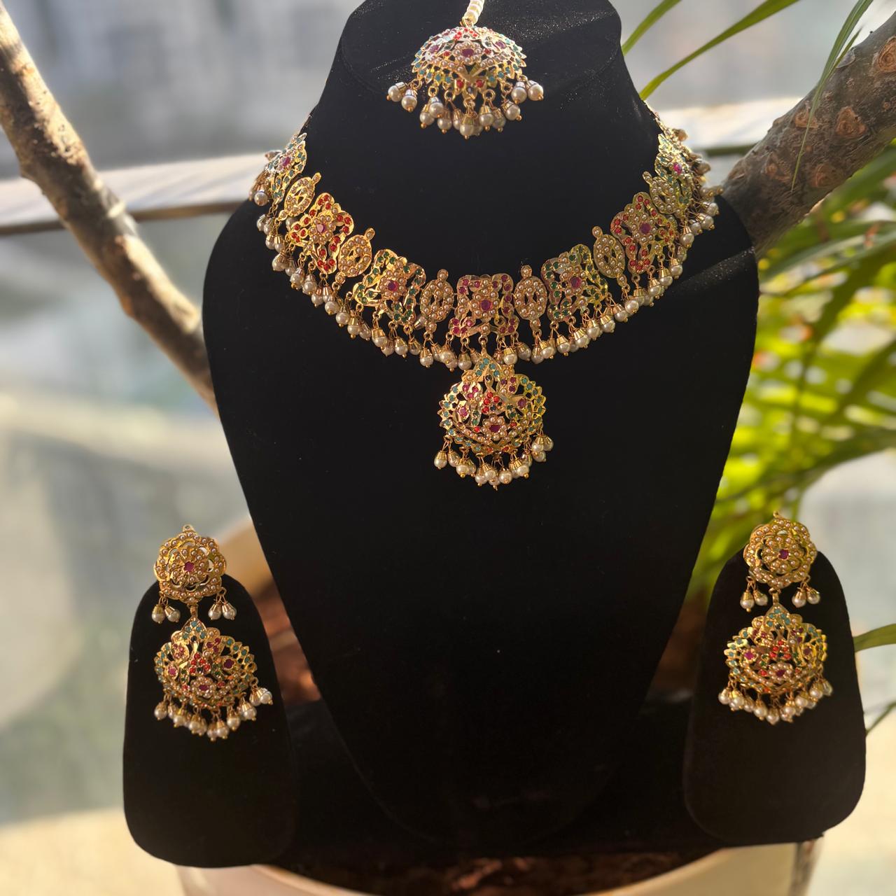 Bride wearing jadau multistone pearls royal Bridal necklace  set