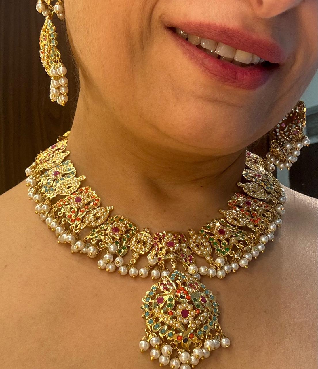 Bride wearing jadau multistone pearls royal Bridal necklace  set