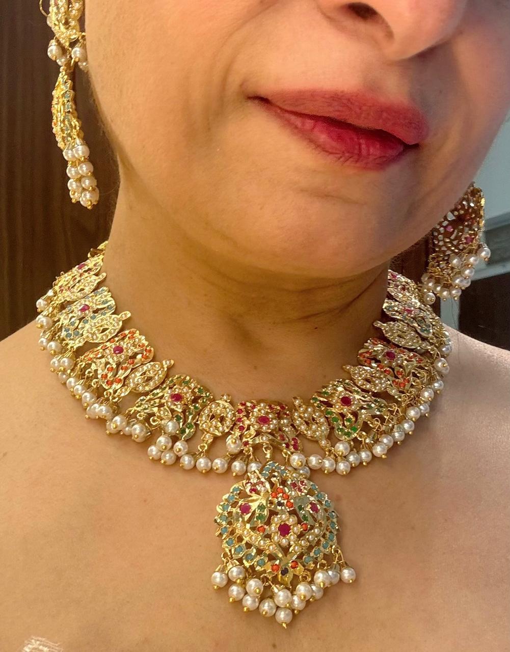 Bride wearing jadau multistone pearls royal Bridal necklace  set