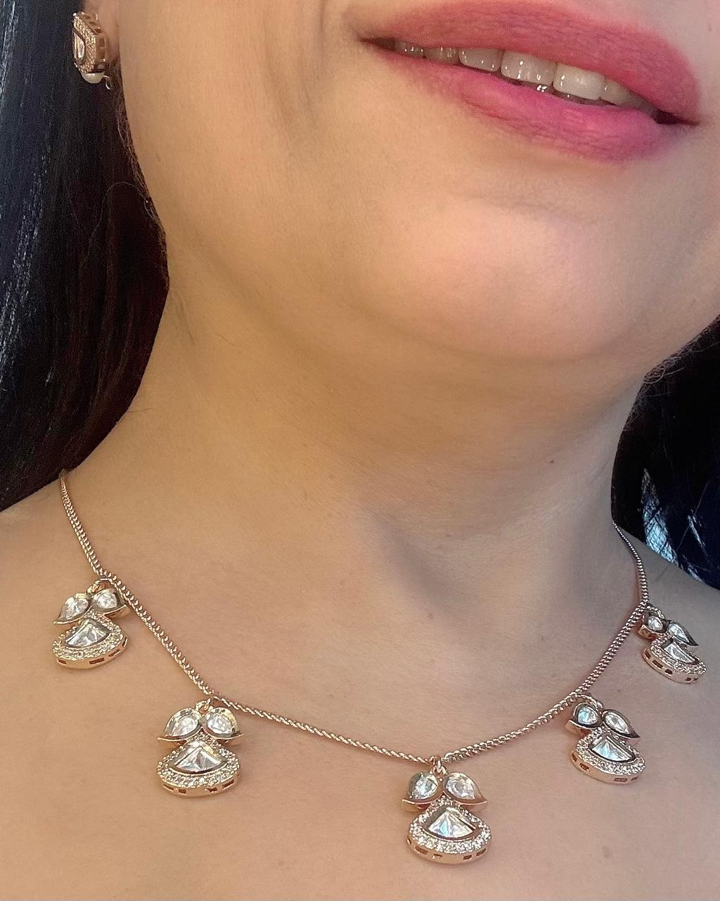dianty kundan and american diamond set in gold