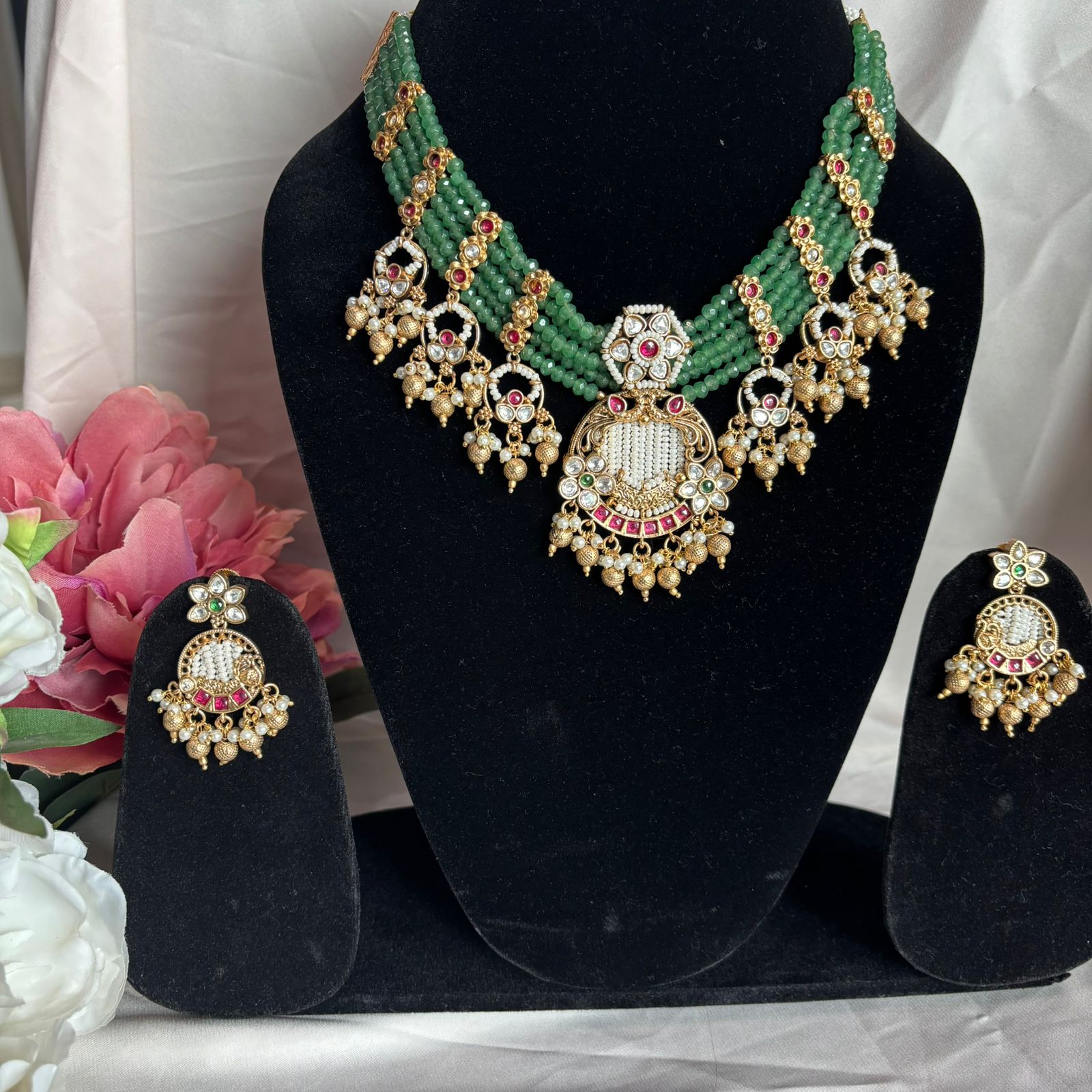  Emerald Beaded Kundan Choker Set with matching statement earrings in green beads, ruby accents and pearl detailing