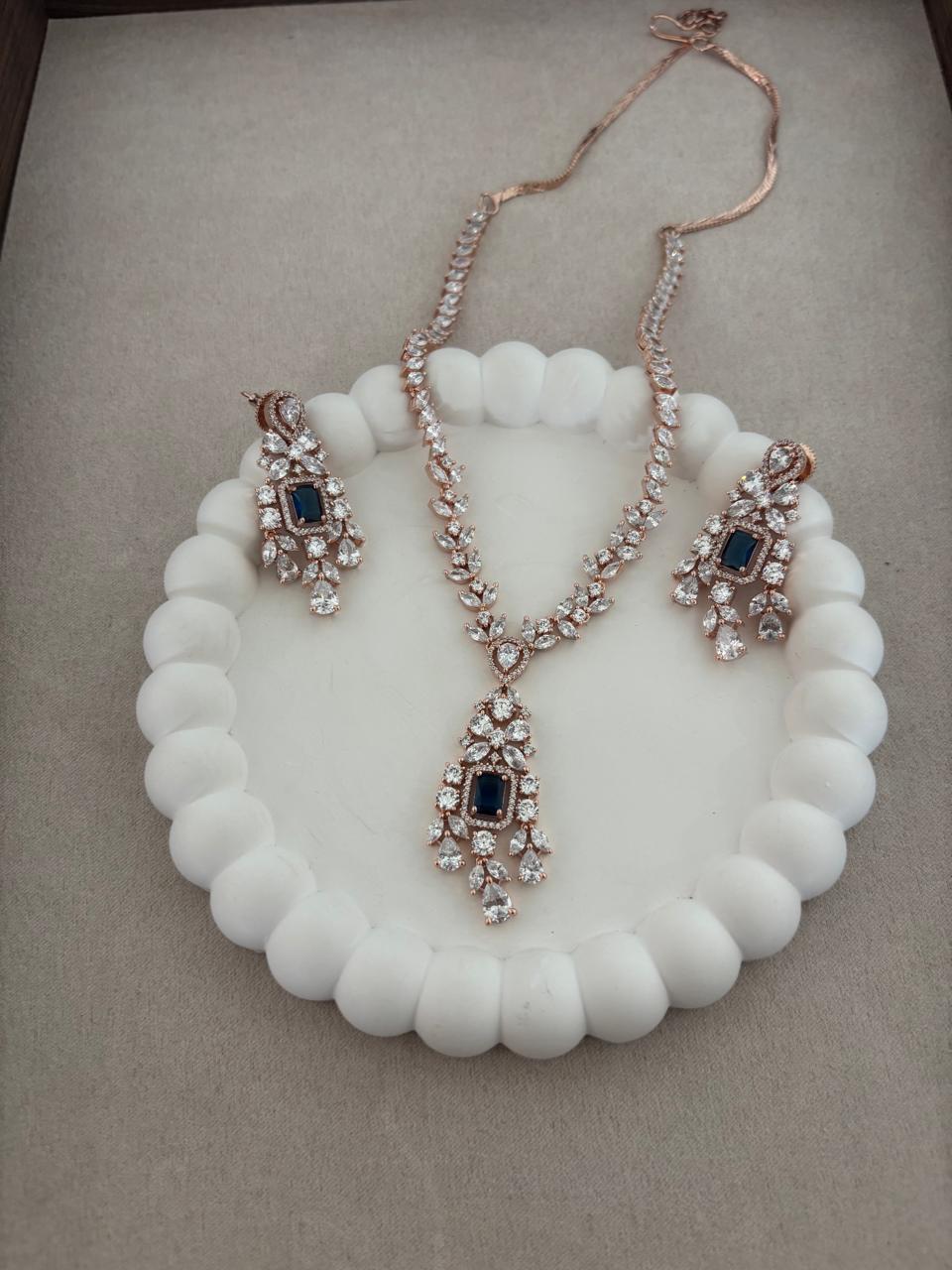 Rosegold Diamond necklace set with blue stone