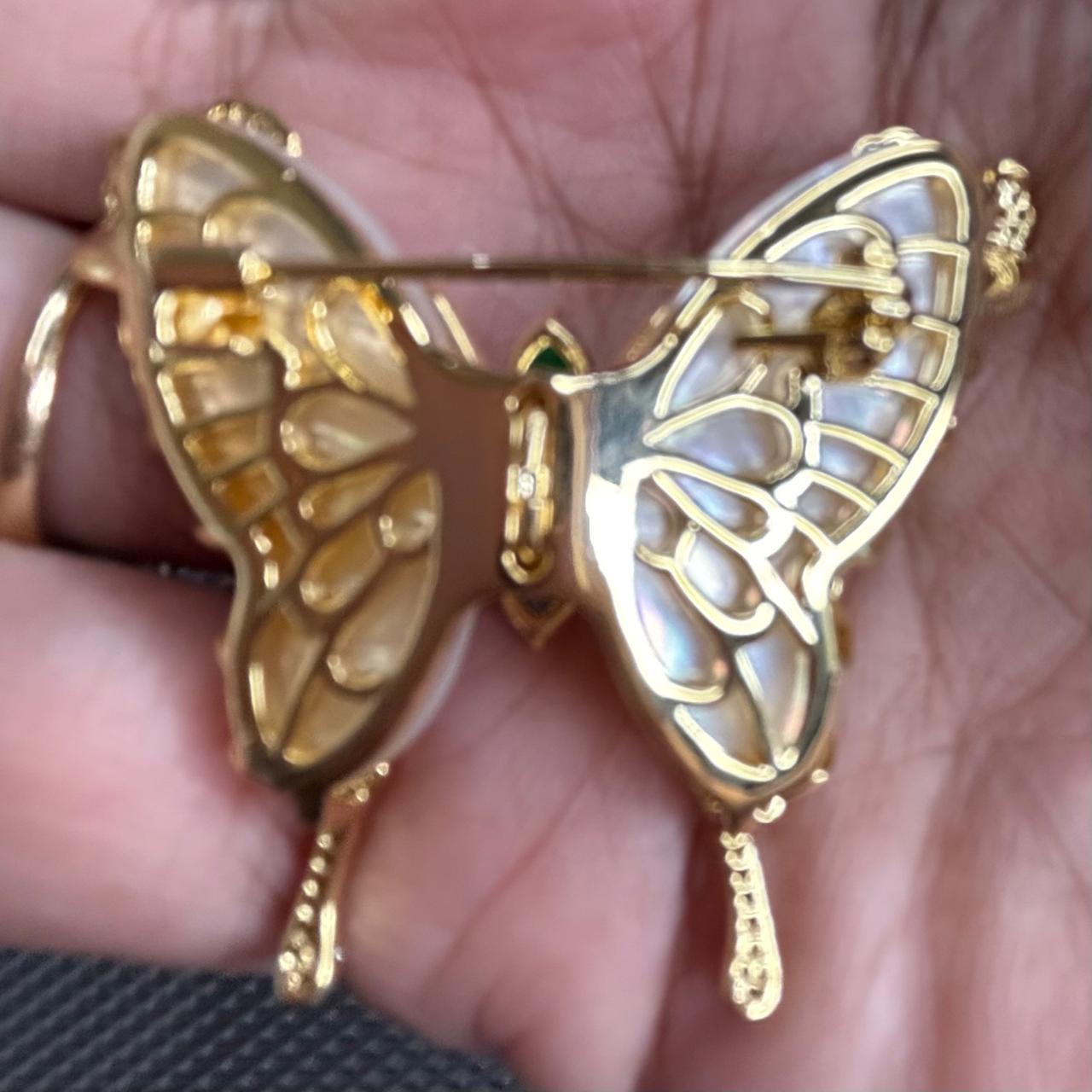 Luxury Mother of Pearl Butterfly Brooch with CZ diamonds detailing, pearl center and gold finish for sarees, blazers, dresses and scarves.