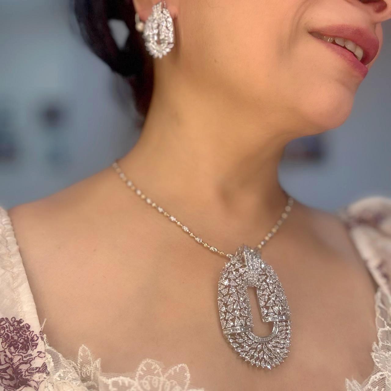 luxury cz diamonds oval silver pendant set with baguette cut diamond and marquise cut diamond and pear cut diamond 