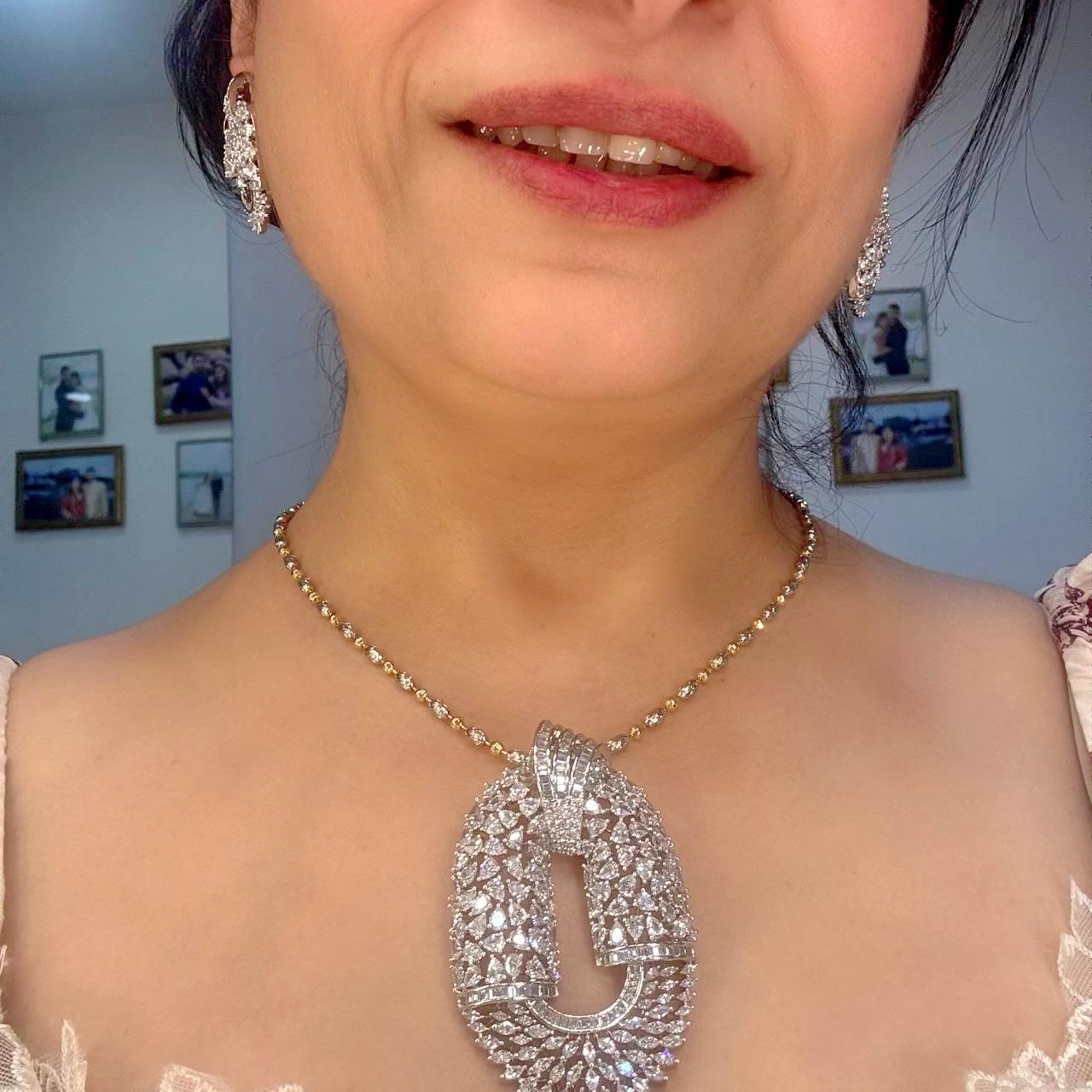 luxury cz diamonds oval silver pendant set with baguette cut diamond and marquise cut diamond and pear cut diamond 