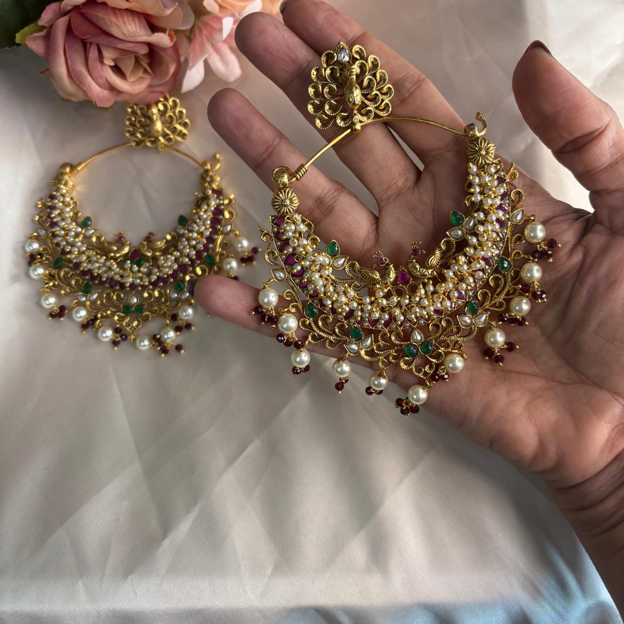 Handcrafted Peacock Chandbali earrings with ruby stones, emerald accents and pearls