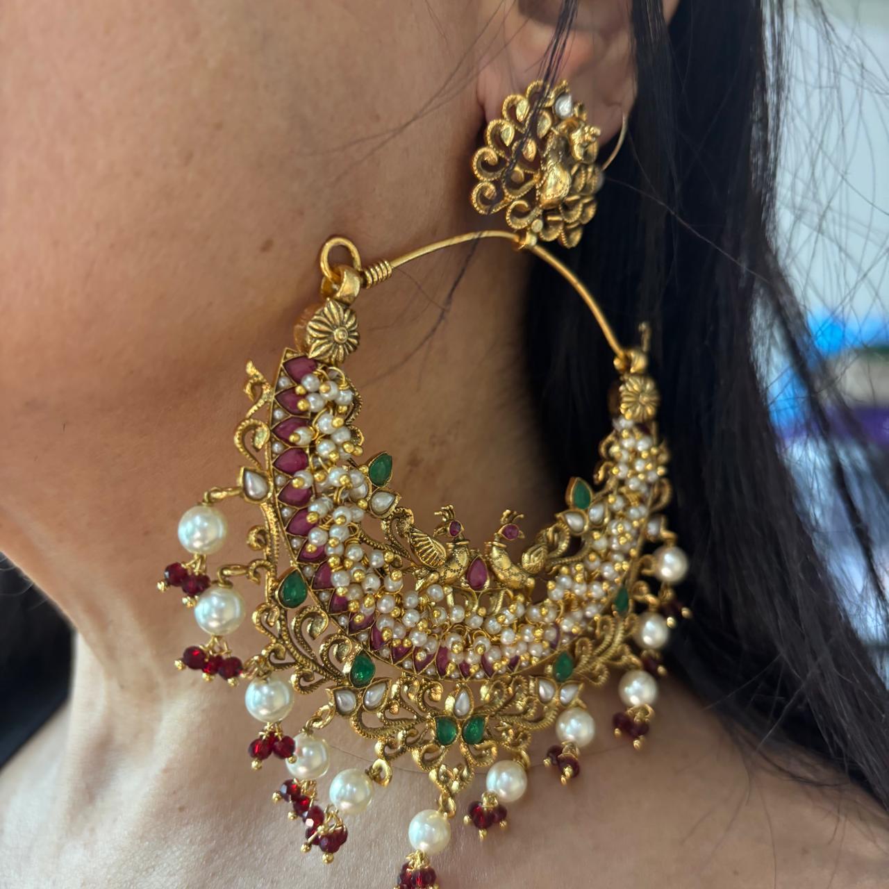 Handcrafted Peacock Chandbali earrings with ruby stones, emerald accents and pearls