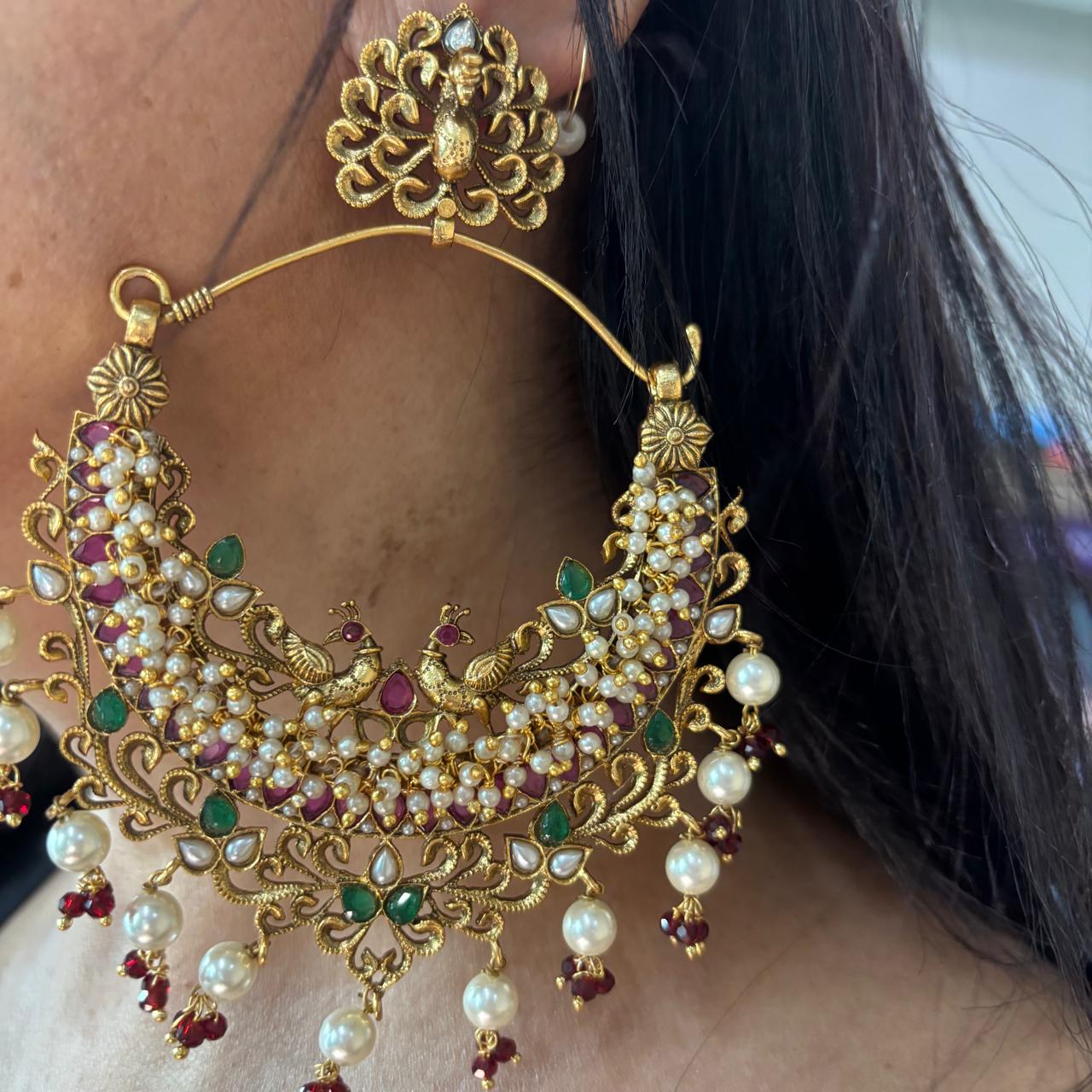 Handcrafted Peacock Chandbali earrings with ruby stones, emerald accents and pearls
