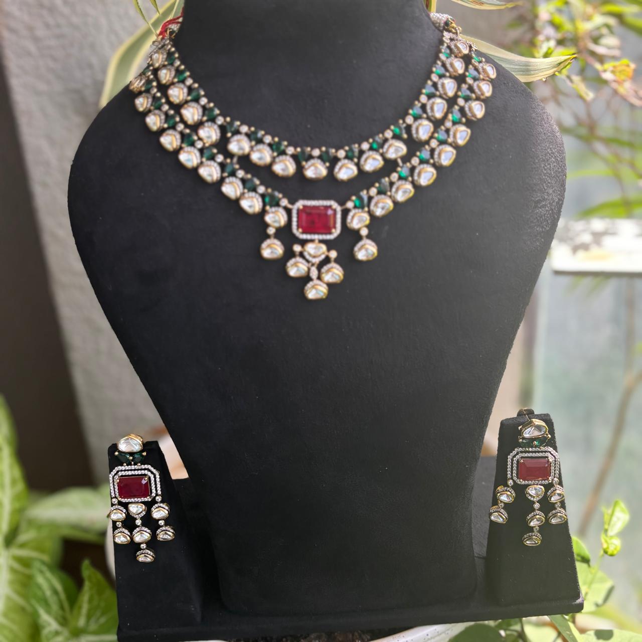  luxurious necklace and earrings with Ruby and polki uncut diamonds