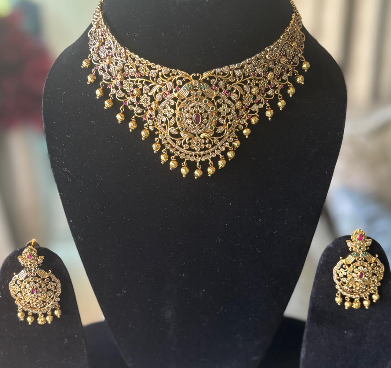 ethnic heritage multistone gold necklace set