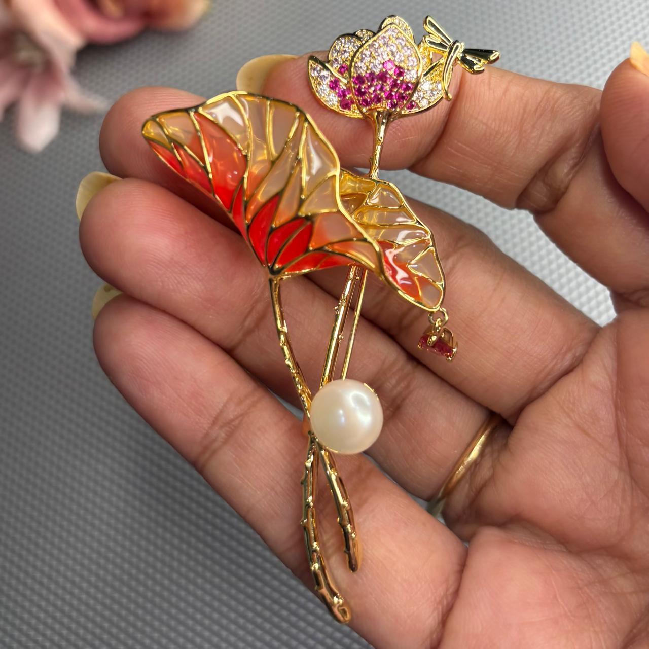Red enamel tulip flower brooch with pearl and cubic zirconia in gold finish by Bebaak Jewels